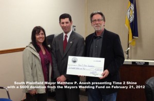 Receiving donation from South Plainfield Mayor Anesh